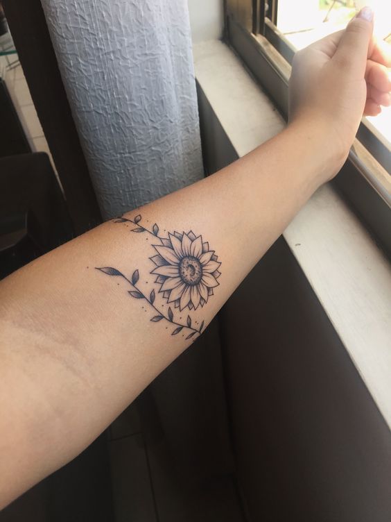 simple flower forearm tattoos